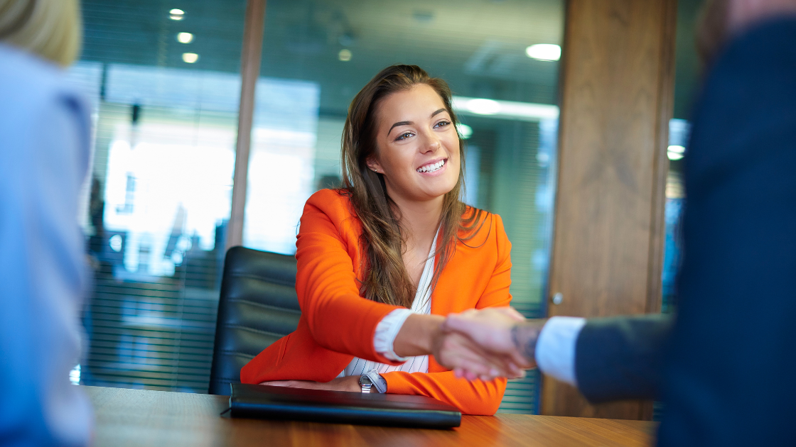 Shaking hand in interview